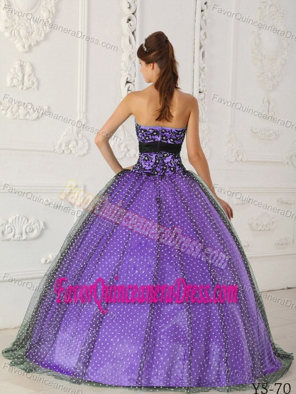 Beaded and Appliqued Black and Purple Quince Dresses in Taffeta and Tulle