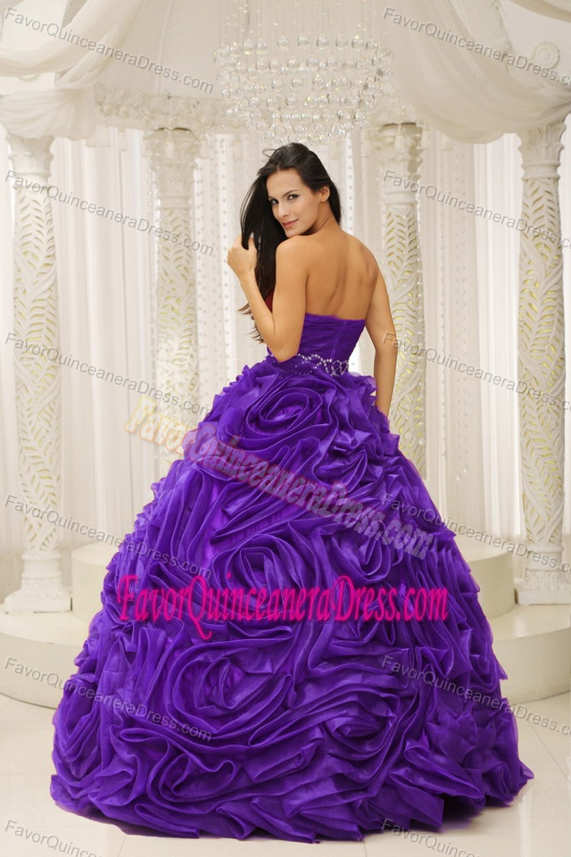 Timeless Dress for Quince with Beaded Sash and Rolling Flowers on the Skirt